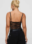 back view of model wearing Princess Polly Wystan Lace Bodysuit Black Sleeveless 