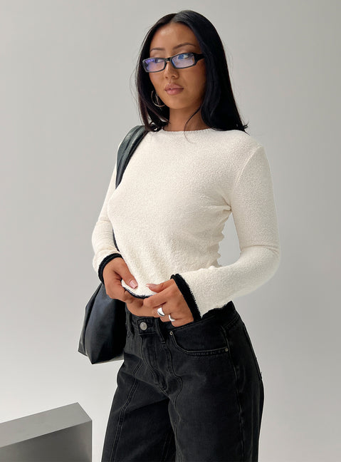 side view of model wearing Princess Polly Keree Lightweight Knit Sweater Cream cropped 