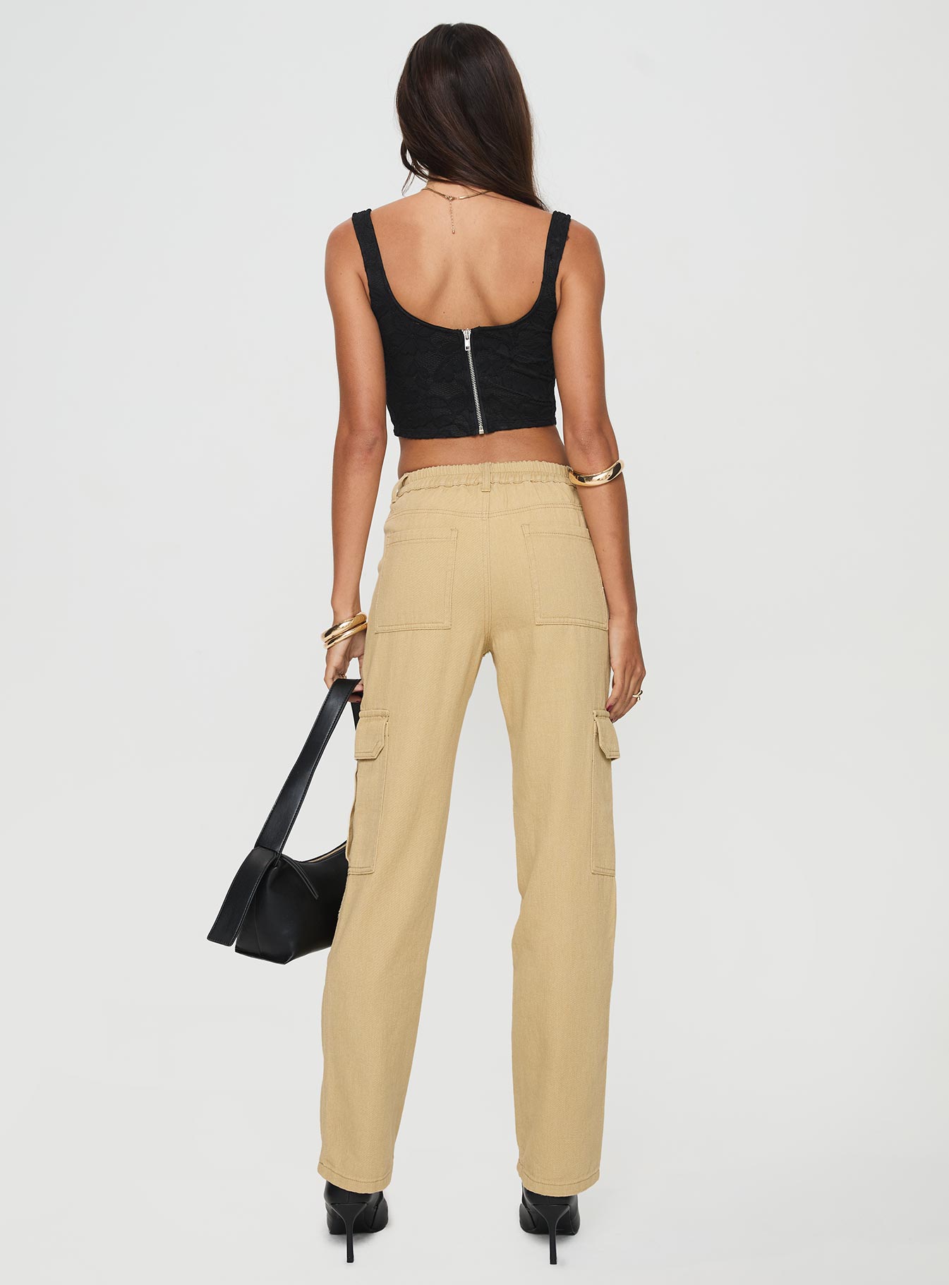 back view of model wearing Princess Polly Nickei Utility Cargo Pants Beige Mid Rise 
