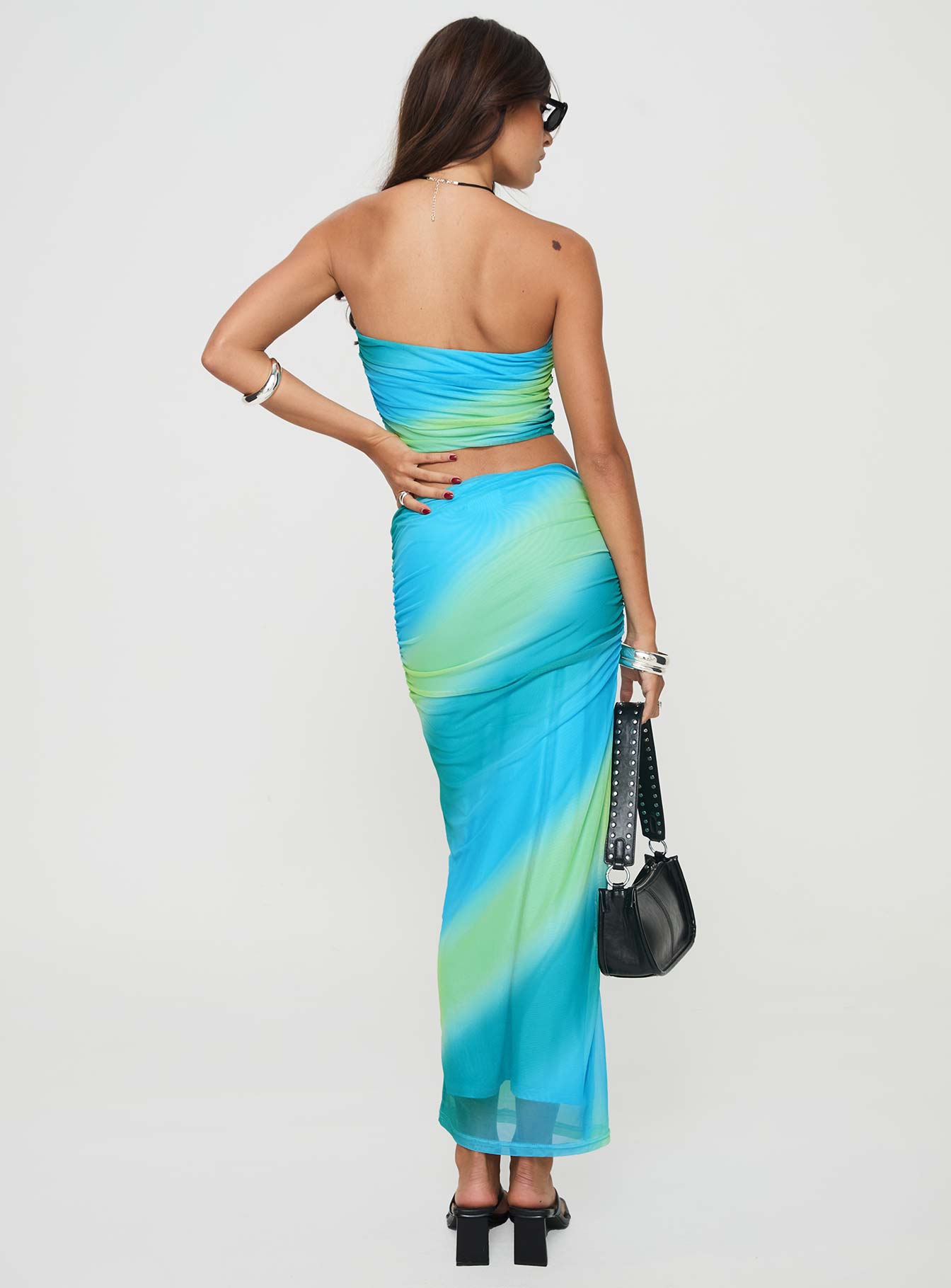 Two piece mesh set Tube top, ruched sides, inner silicone strip at bust Maxi skirt, thin elasticated waistband, ruching down sides Good stretch, fully lined