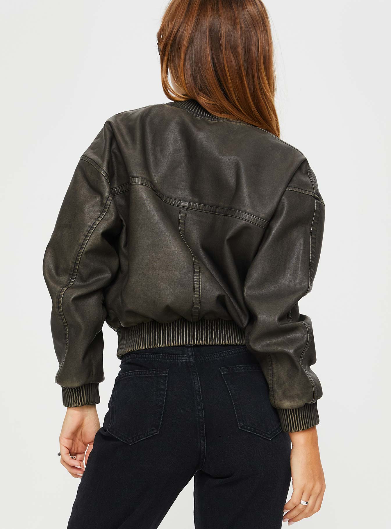 Washed green Faux leather jacket Drop shoulder, ribbed collar, cuff & hem, twin hip pockets with clasp fastening, zip fastening at the front