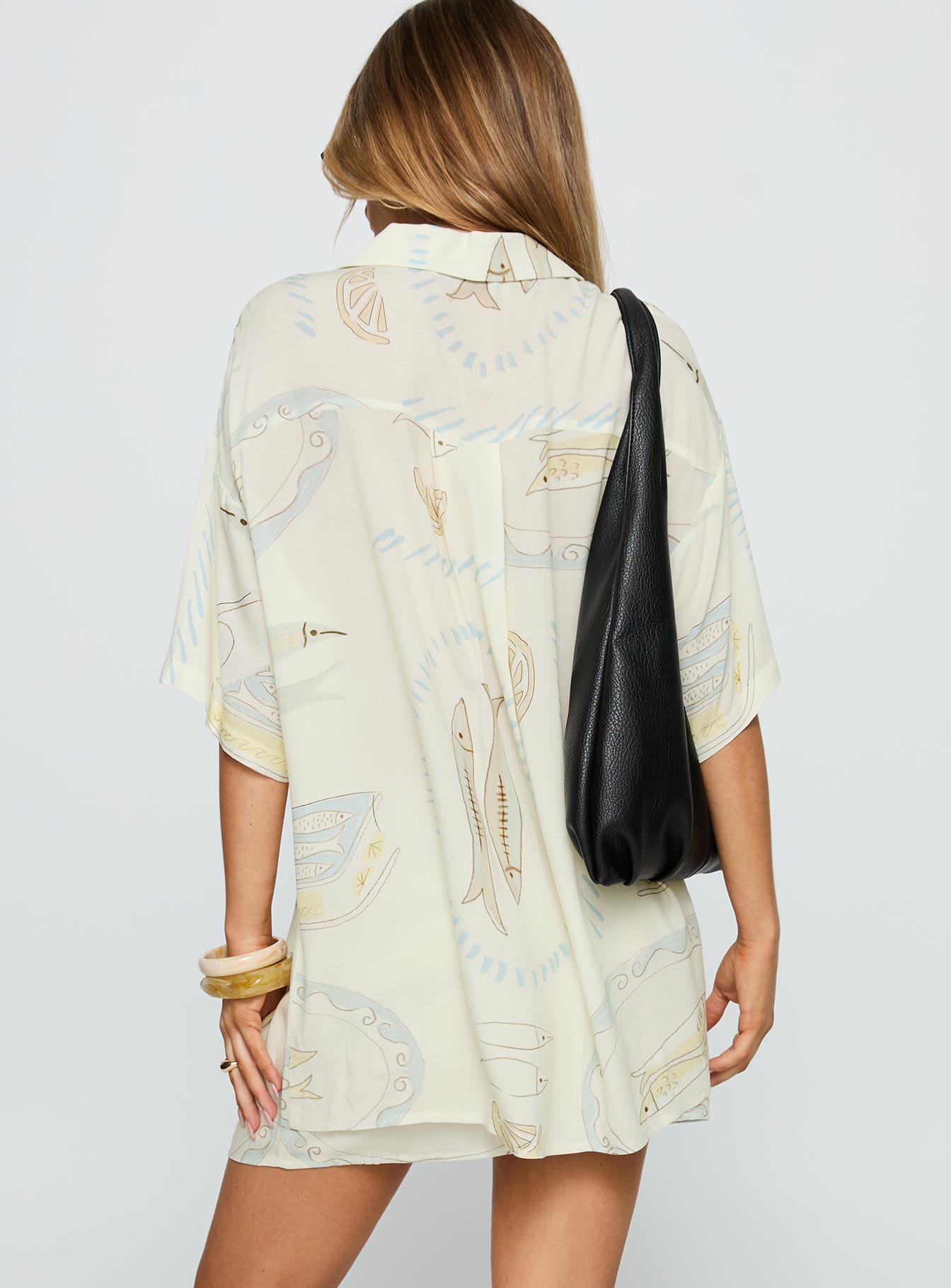 back view of model wearing Princess Polly Caraliia Shirt Cream Half Sleeves V-Neck 