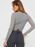 Long sleeve mesh top High neckline, adjustable ruching at sleeves with tie fastening