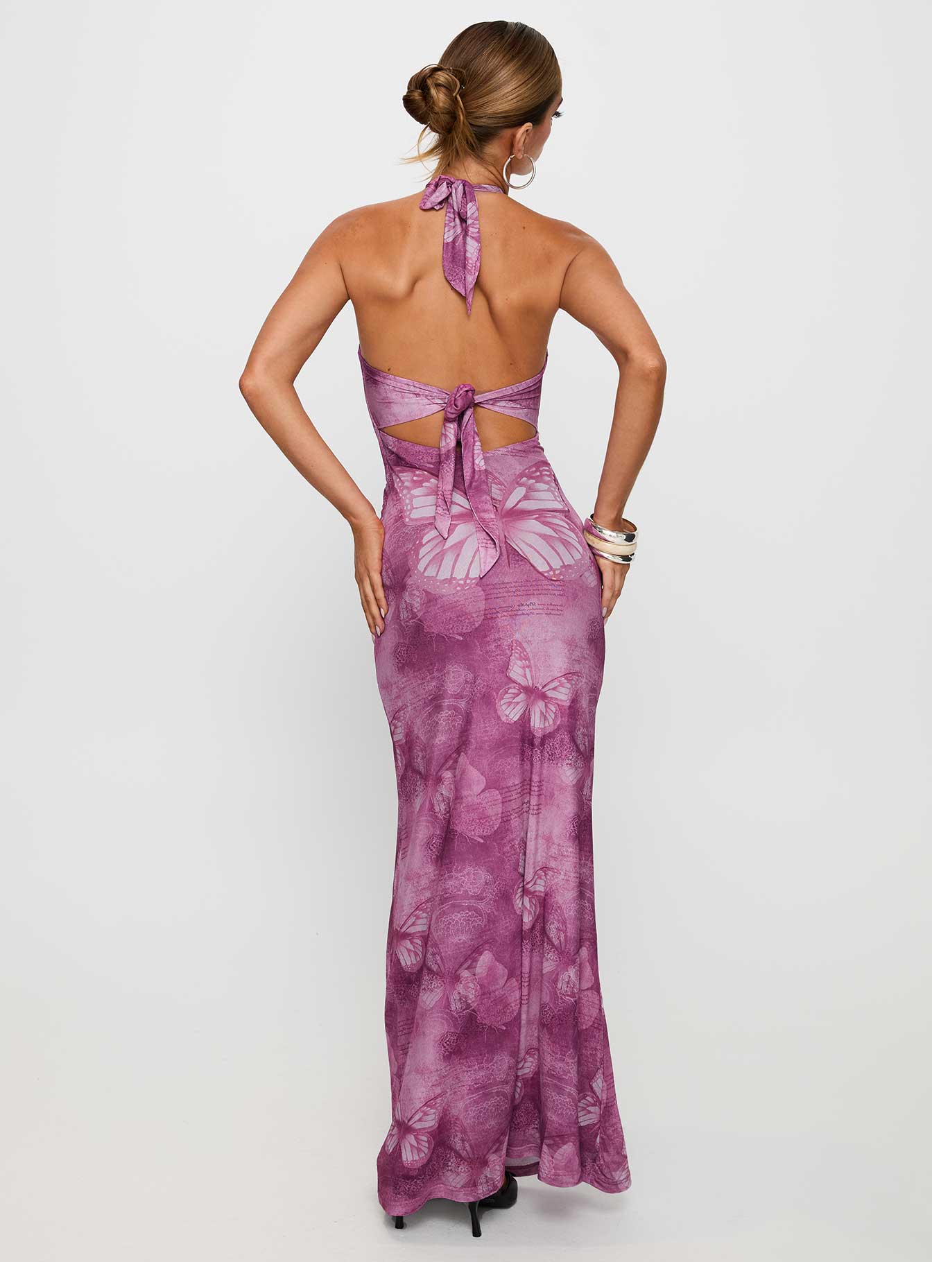 back view of model wearing Princess Polly Nathaleia Halter Maxi Dress Purple Asymmetric Neckline 