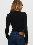 back view of model wearing Princess Polly Suzu Long Sleeve Top Black Full Sleeves High Neck 