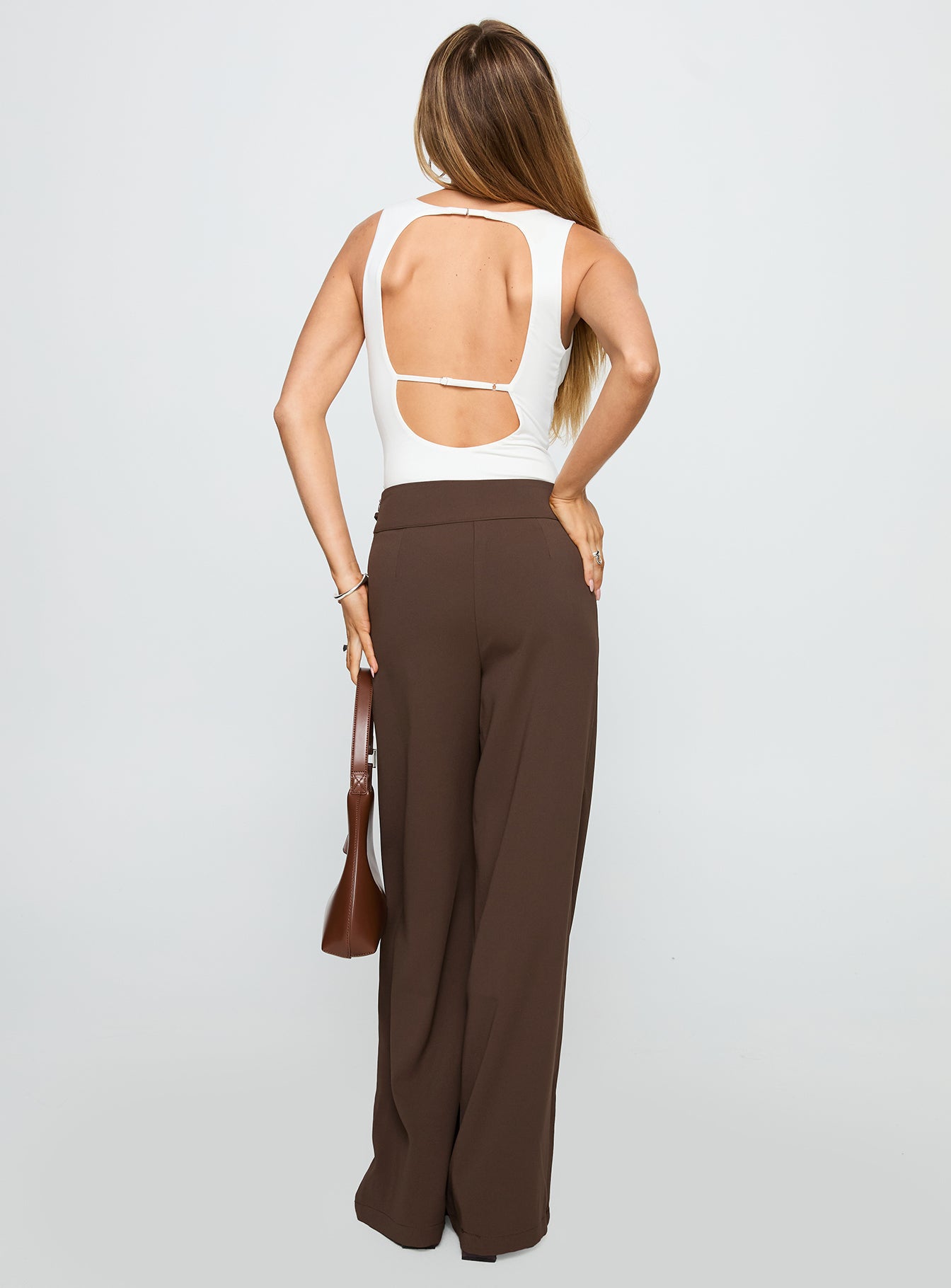 back view of model wearing Princess Polly Rush Hours Pants Chocolate High Waisted Pants 