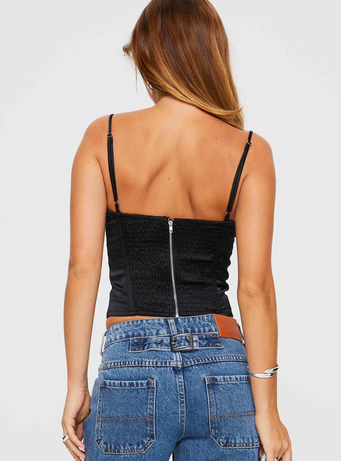 back view of model wearing Princess Polly Marlu Top Black Sleeveless Sweetheart 