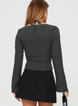 Long sleeve top Square neckline, ribbon detail, invisible zip fastening at side, halter neck tie fastening