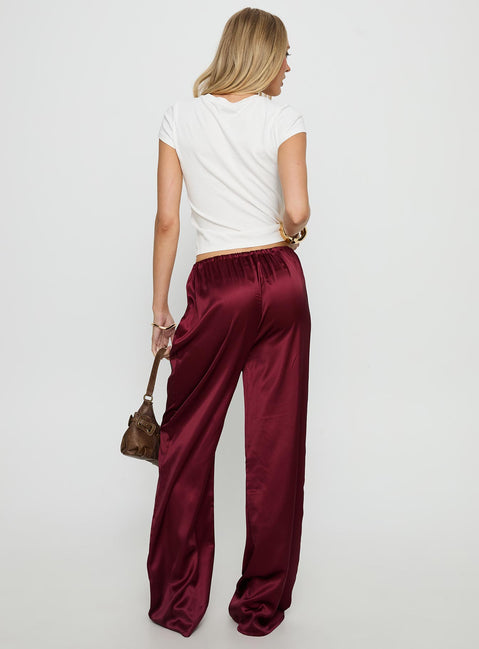 back view of model wearing Princess Polly Soulstar Satin Pants Wine Mid Rise Pants 