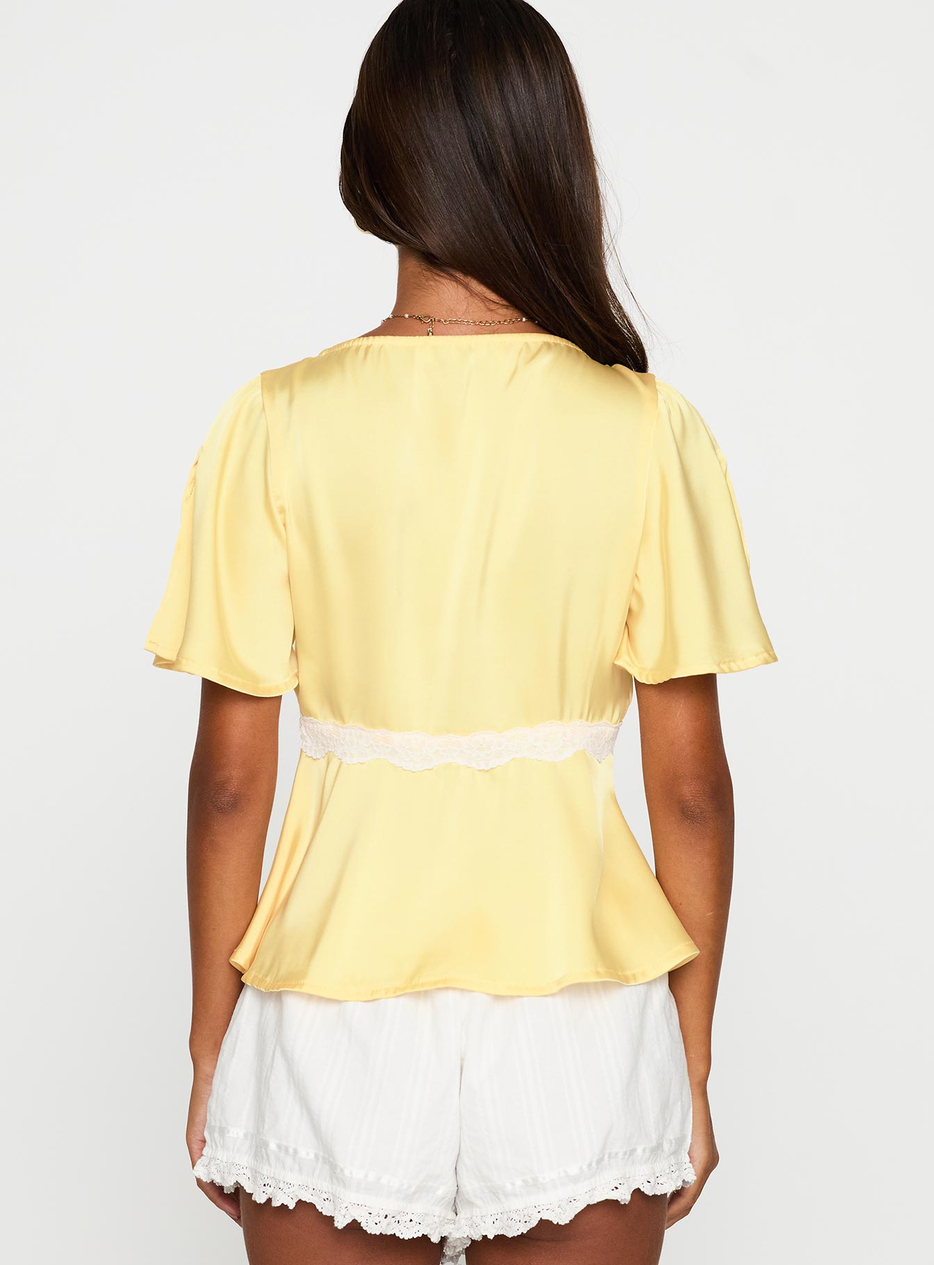 back view of model wearing Princess Polly For The Summer Lace Trim Top Yellow Short Sleeves Plunger 