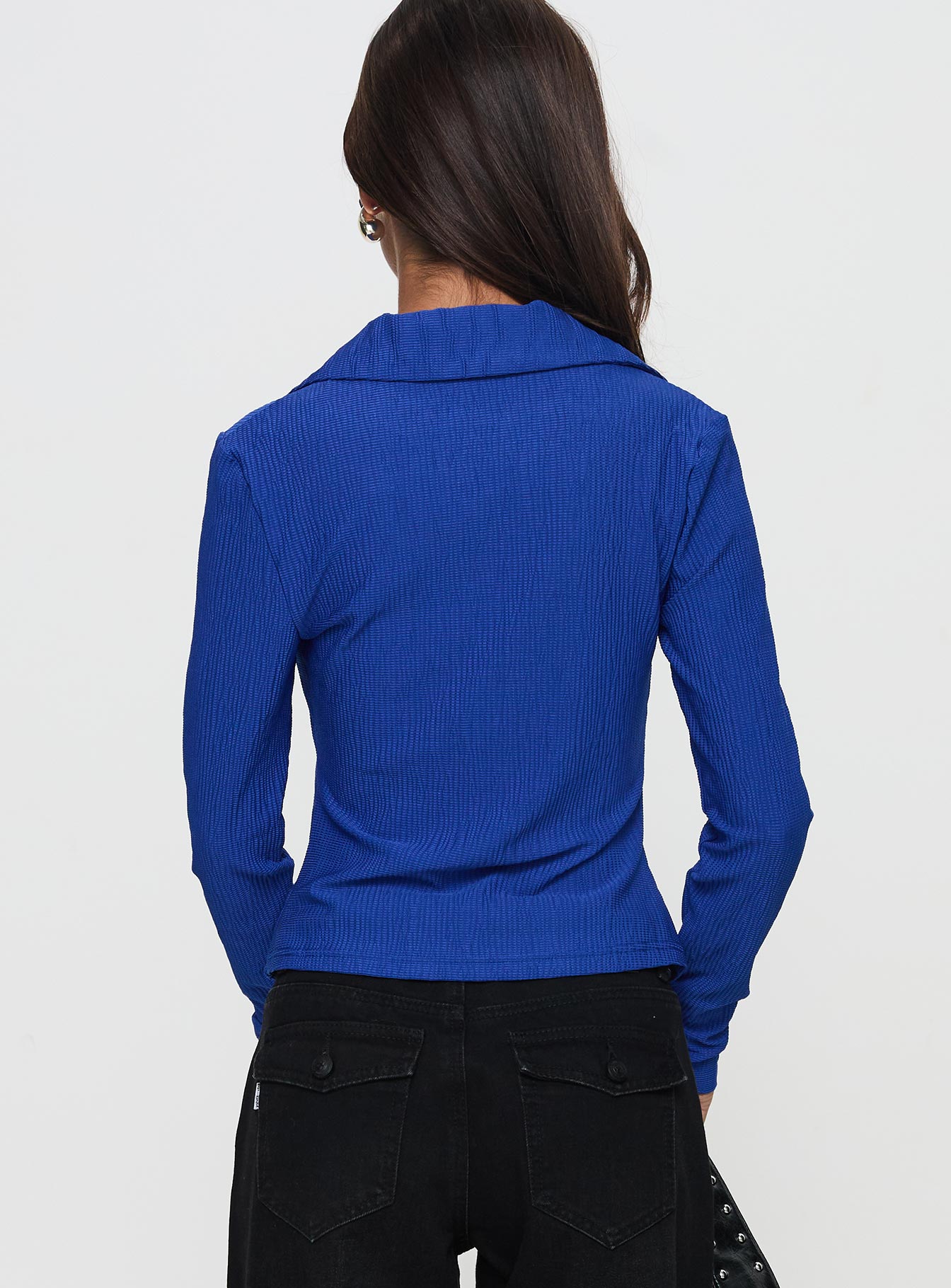 back view of model wearing Princess Polly Echoes Long Sleeve Top Blue Full Sleeves V-Neck 