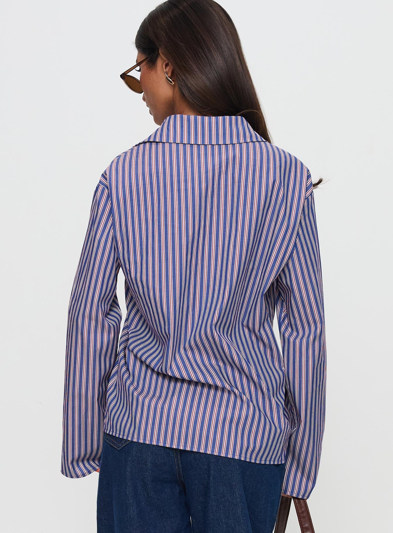 back view of model wearing Princess Polly Trillian Long Sleeve Top Navy Stripe Full Sleeves V-Neck 