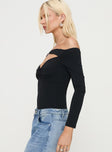 side view of model wearing Princess Polly Bleue Long Sleeve Bodysuit Black Full Sleeves 