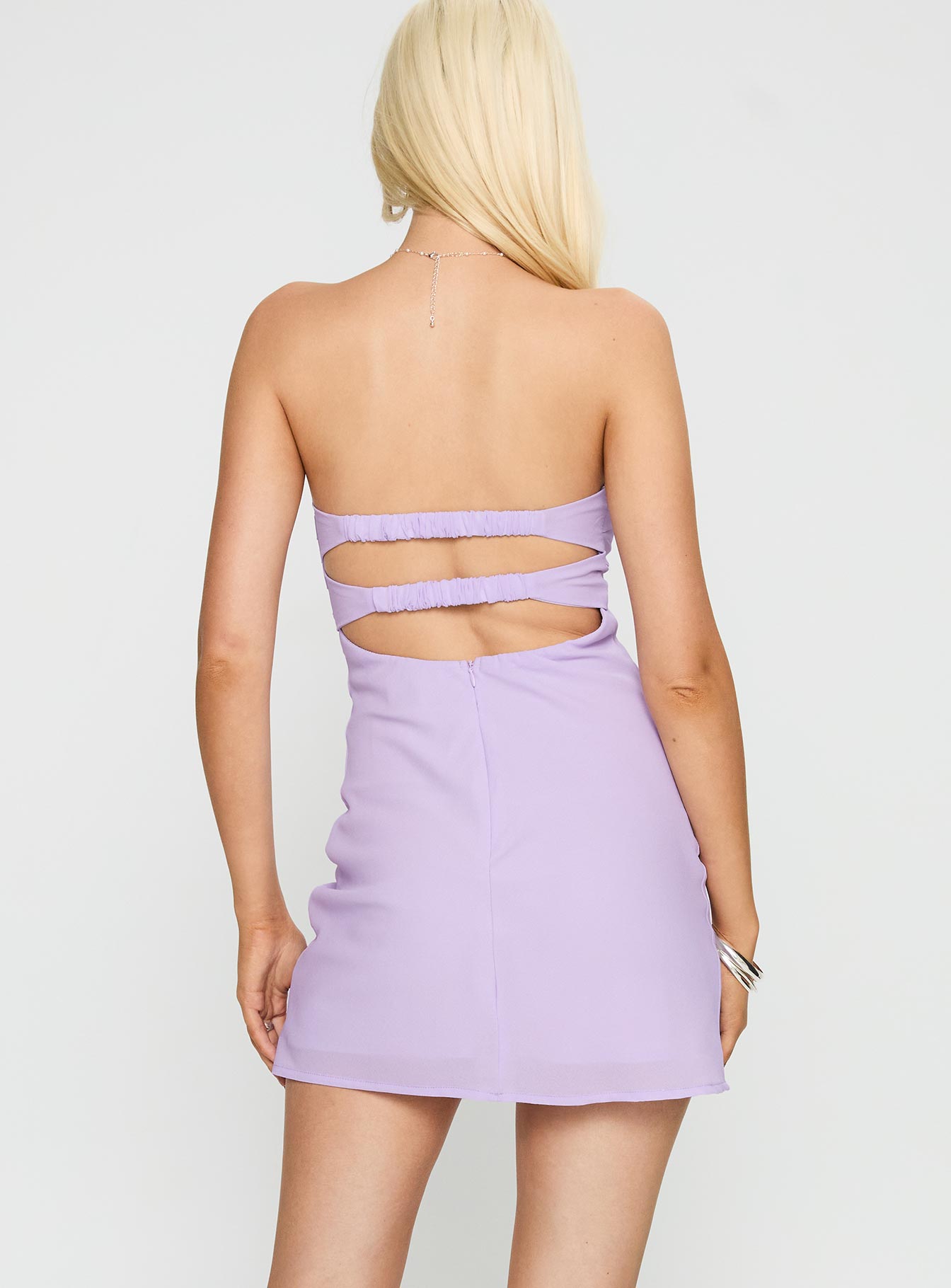 back view of model wearing Princess Polly Ilana Strapless Mini Dress Lilac Sweetheart Neckline 