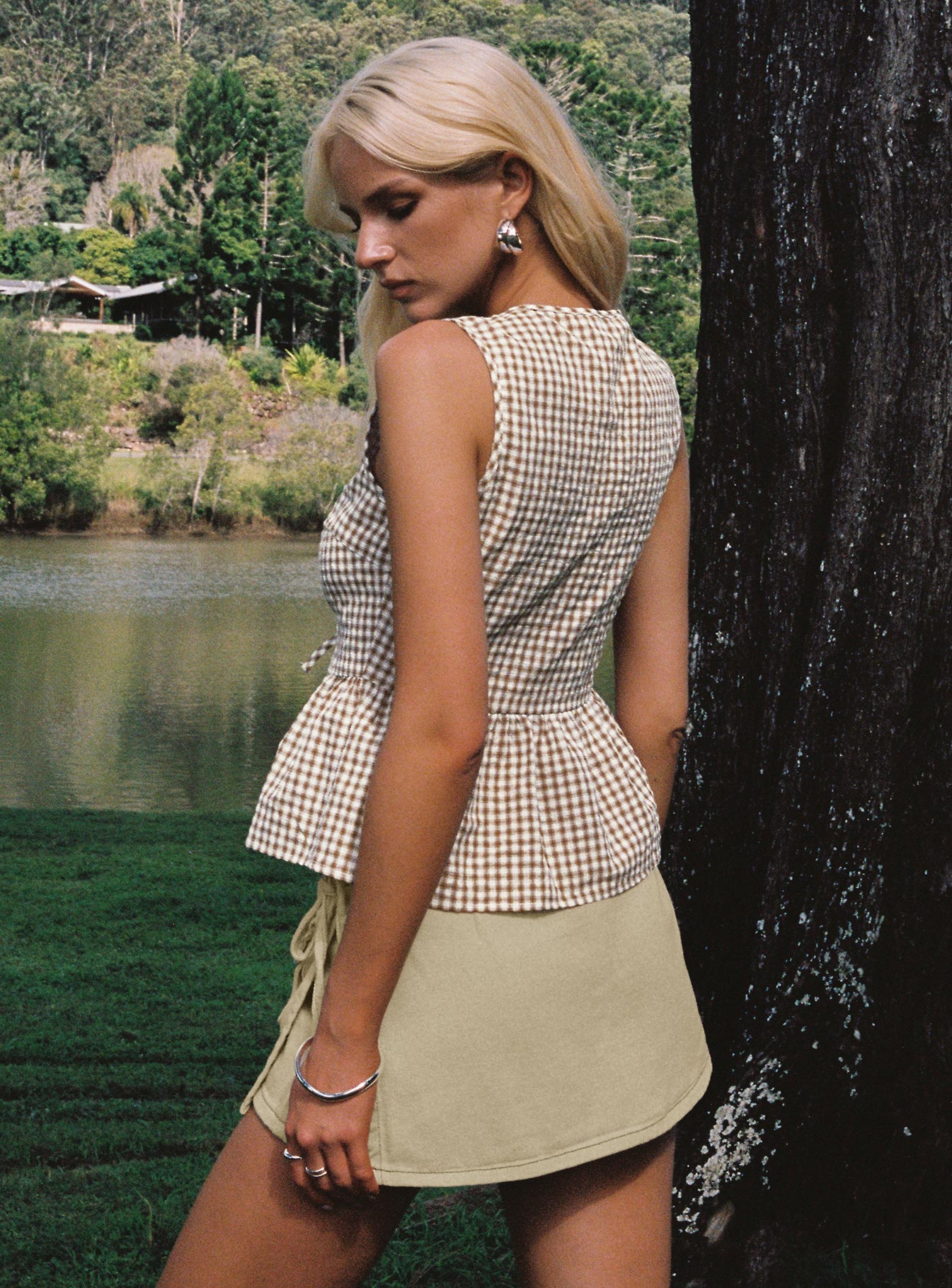 back view of model wearing Princess Polly Rosellah Tie Up Top Brown Check Sleeveless Crew Neck 