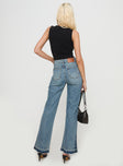 back view of model wearing Princess Polly Farleigh Flare Jeans Blue High Waisted 