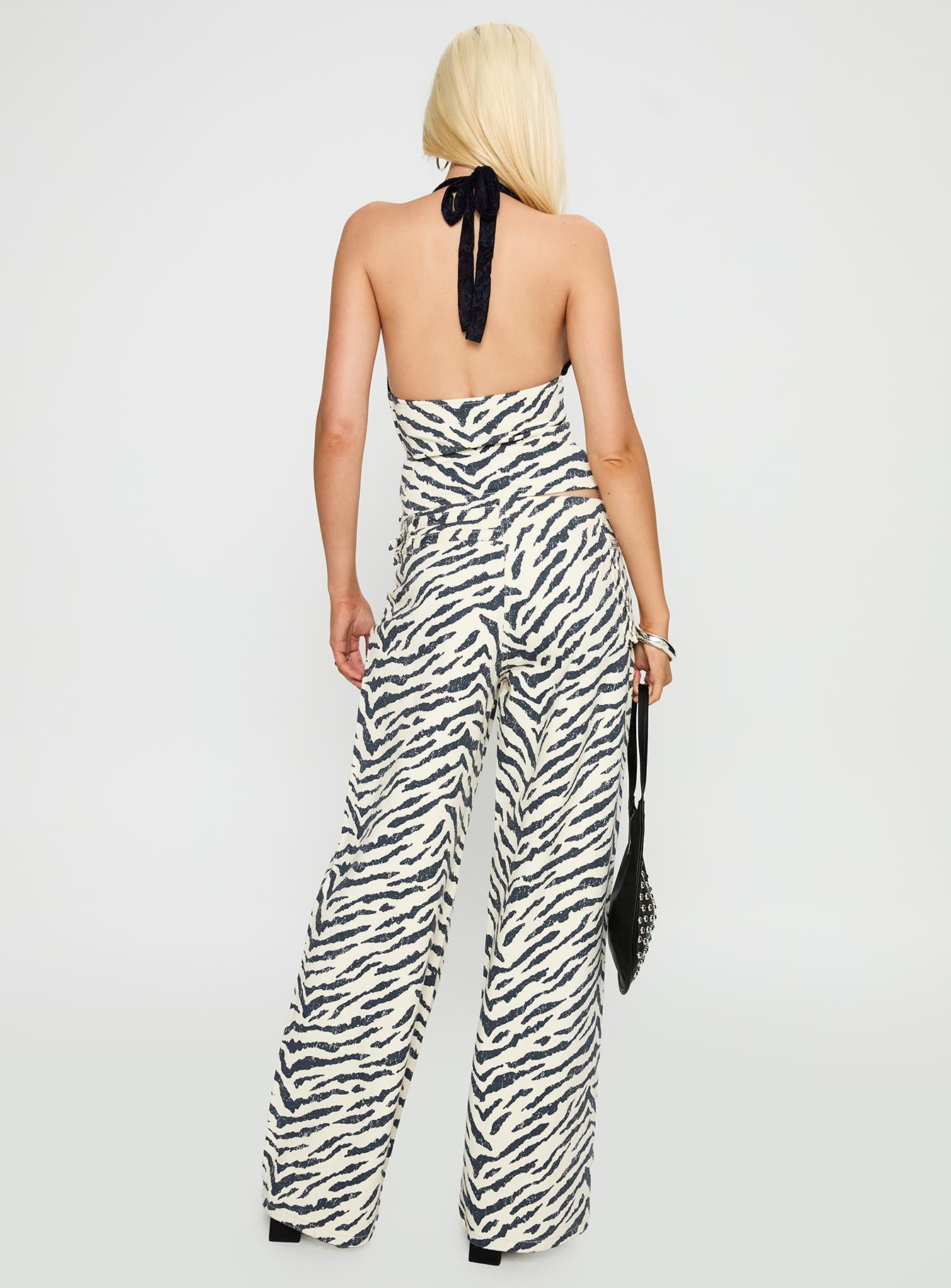back view of model wearing Princess Polly Paltrow Cargo Pant Zebra High Waisted 