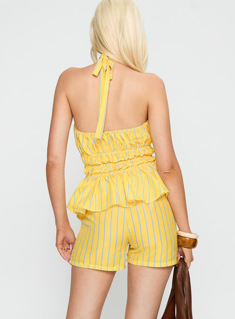 back view of model wearing Princess Polly Delicacy Short Yellow High Waisted Shorts 