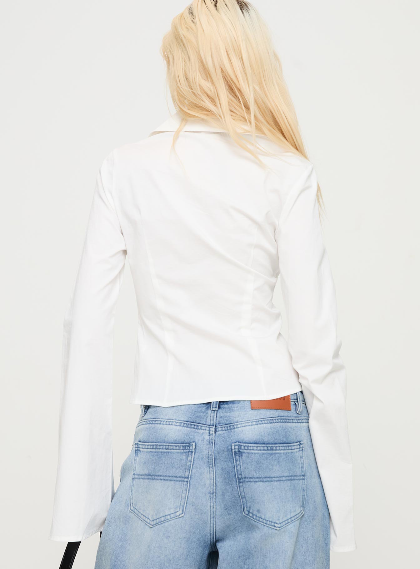 back view of model wearing Princess Polly Merritt Top White Full Sleeves High Neck 