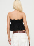 back view of model wearing Princess Polly Sascia Strapless Top Black Sleeveless straight 