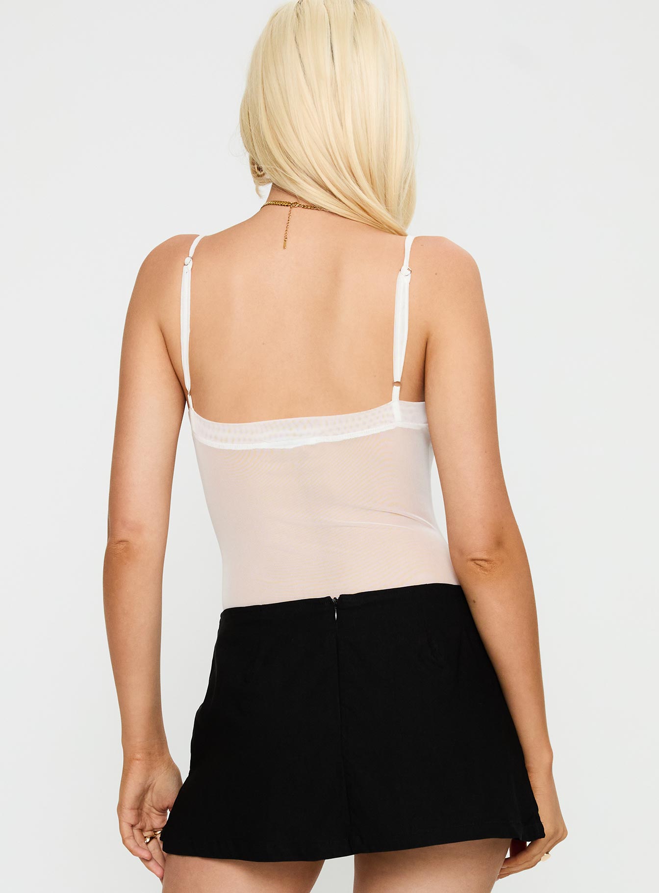 back view of model wearing Princess Polly In The Club Bodysuit White Sleeveless 