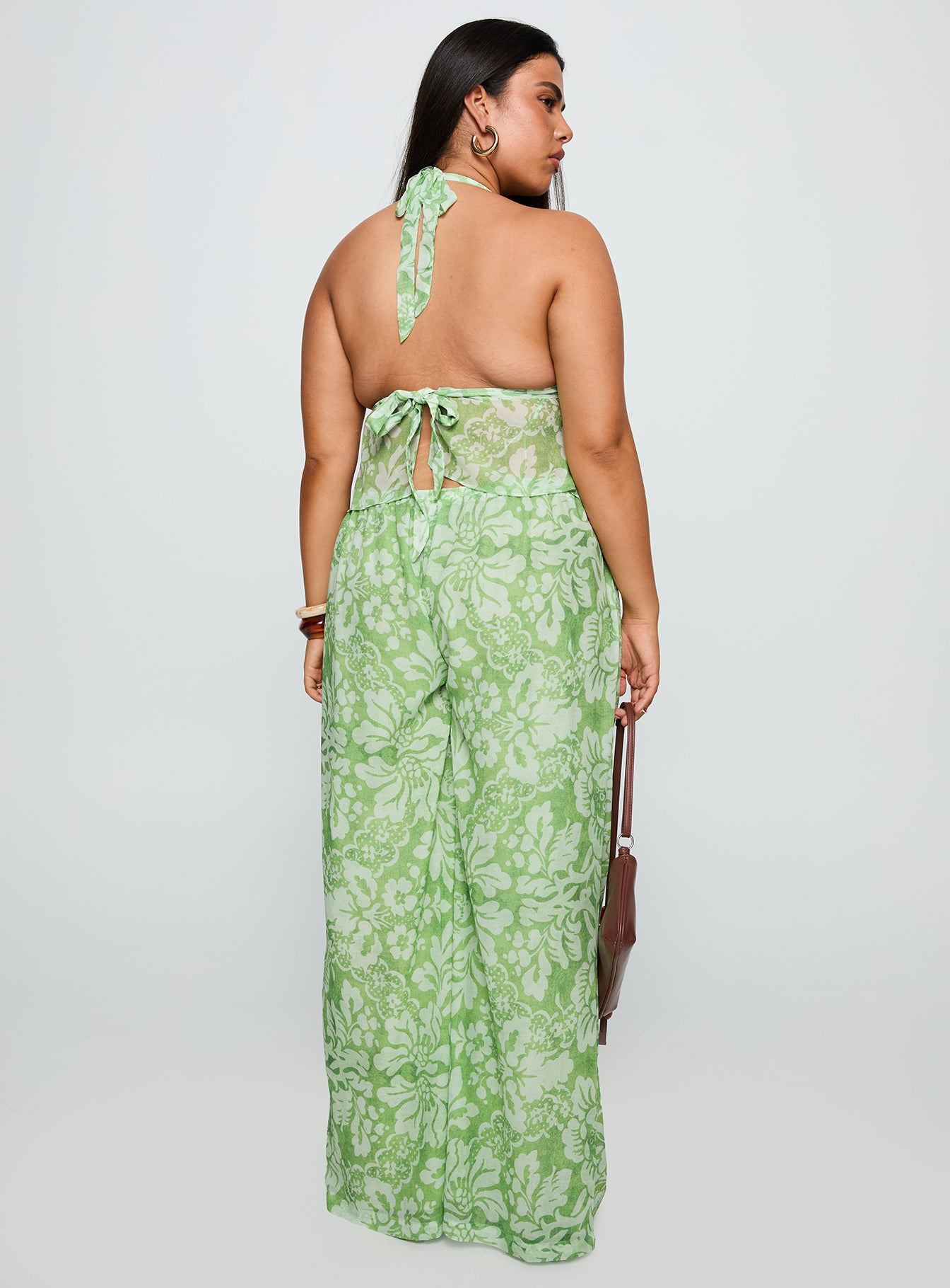 back view of model wearing Princess Polly Finesse Pants Green Floral Curve High Waisted Pants 