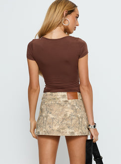 back view of model wearing Princess Polly Redford Low Rise Denim Mini Skirt Camouflage Mini Skirts 