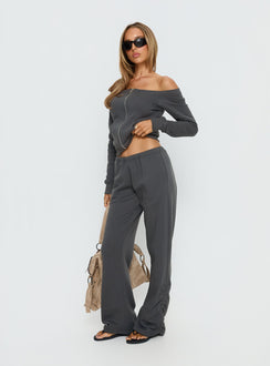 side view of model wearing Princess Polly Rylan Low Rise Joggers Grey Low Rise Pants 