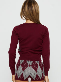 back view of model wearing Princess Polly Raiven Knit Cardigan Burgundy Argyle cropped 