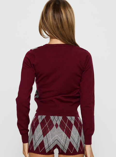 back view of model wearing Princess Polly Raiven Knit Cardigan Burgundy Argyle cropped 
