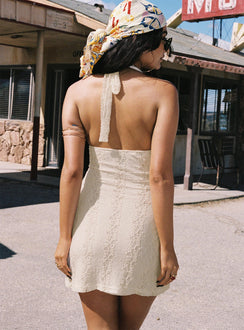 back view of model wearing Princess Polly Youthful Spirit Halter Mini Dress Cream Plunger 