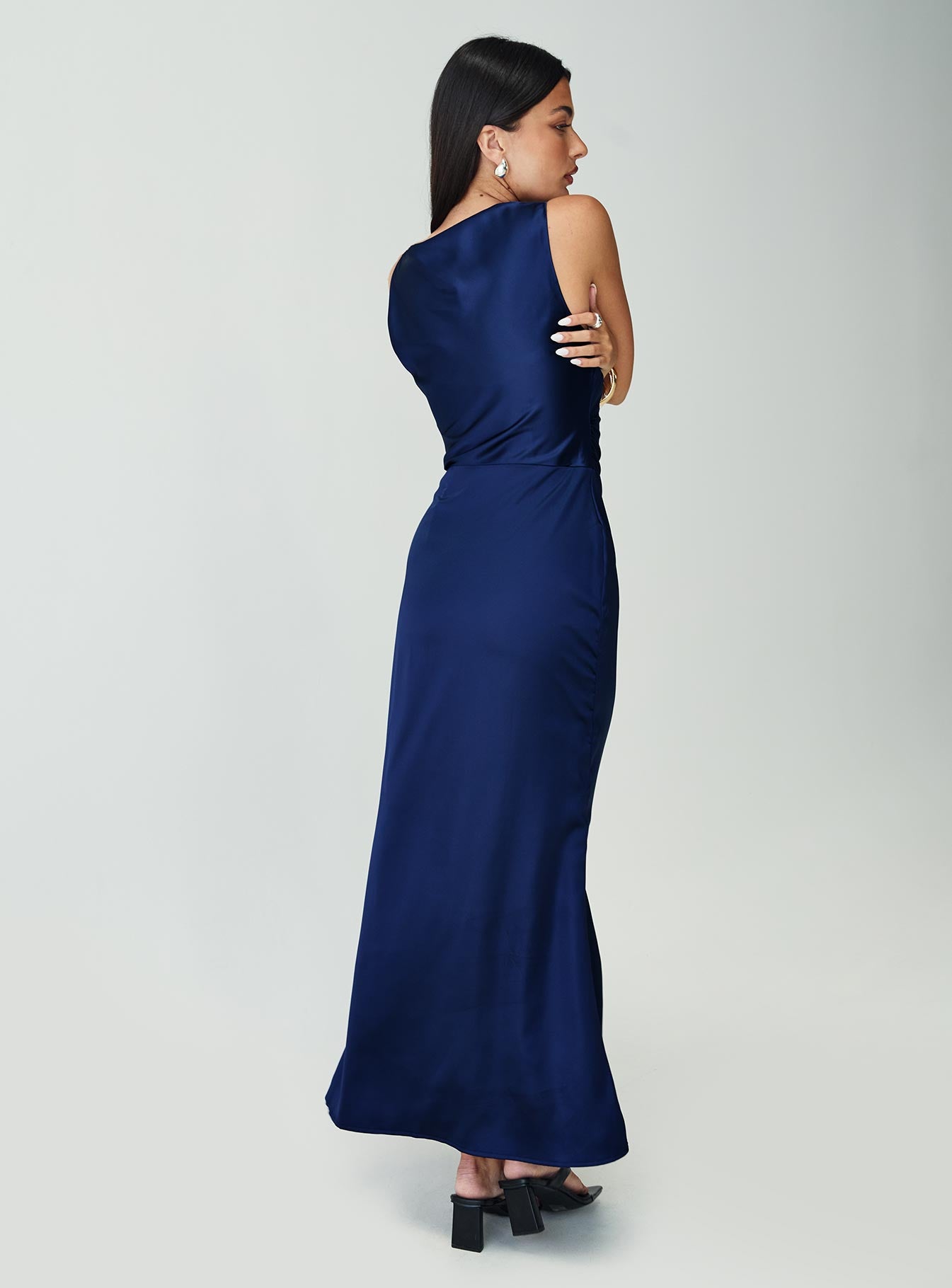 https://www.showpo.com/eu/cariela-plunge-neck-satin-maxi-dress-in-navy.html Cariela Midi Dress - Plunge Neck Satin Dress in Navy