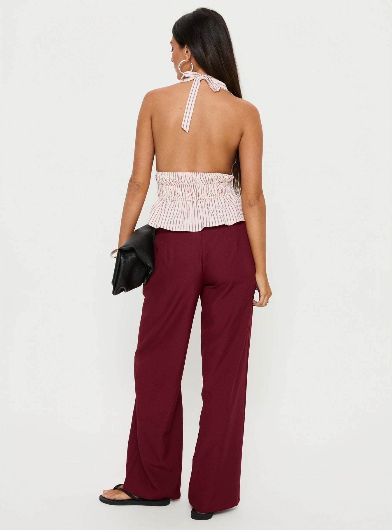 back view of model wearing Princess Polly Good Riddance Pleat Tie Slouch Pants Burgundy Mid Rise Pants 