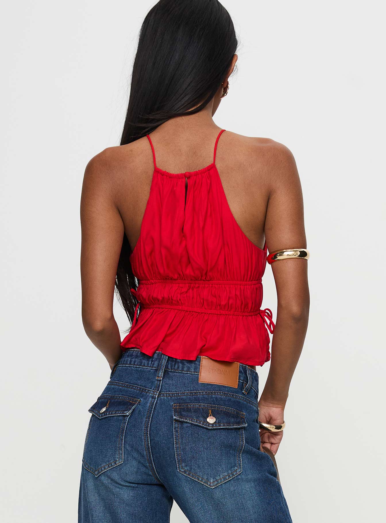 back view of model wearing Princess Polly Rozier Top Red Sleeveless High Neck 