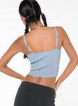 Rib knit crop top, v-neckline Adjustable shoulder straps Good stretch, unlined 