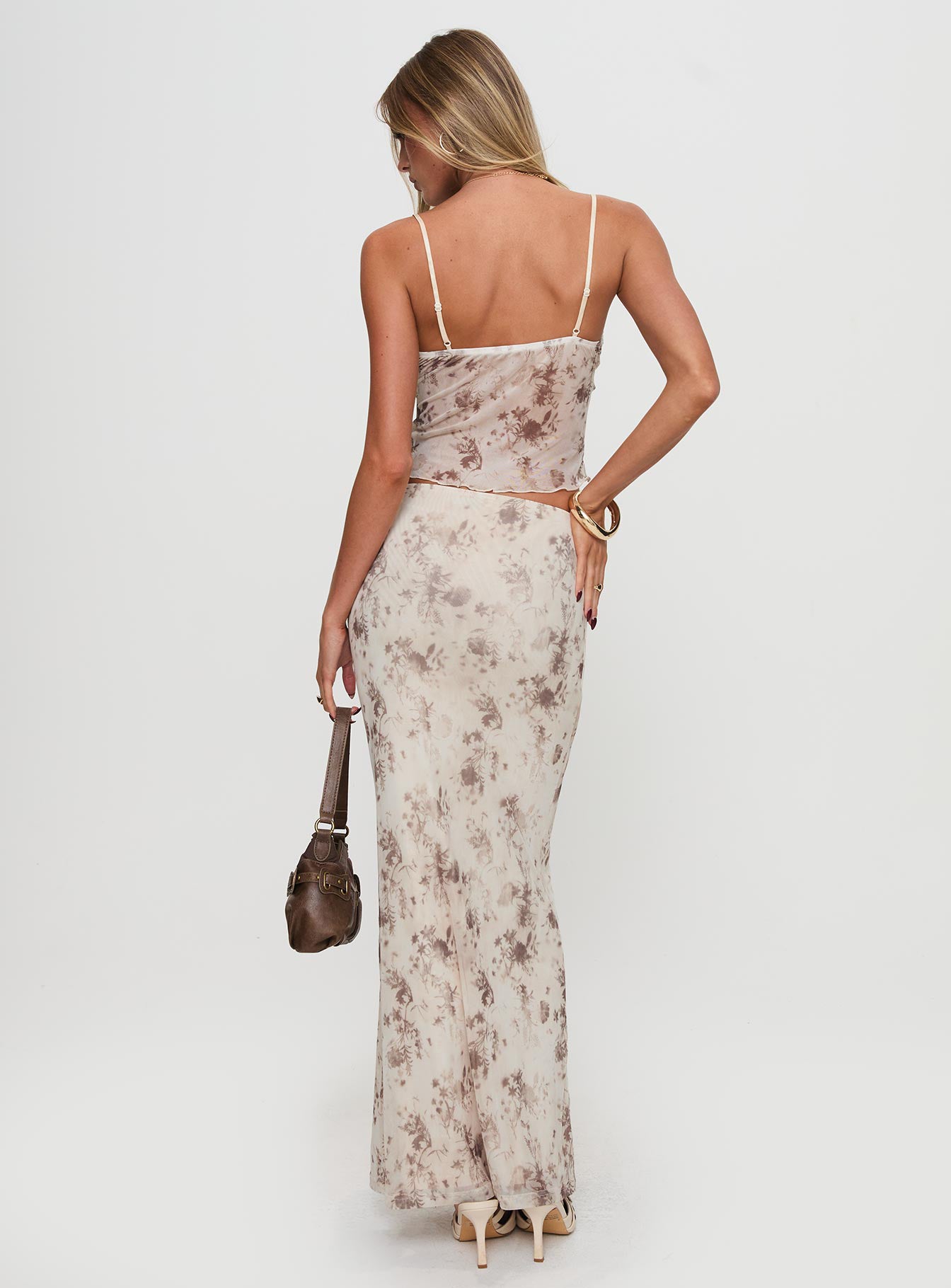 back view of model wearing Princess Polly Shepherd Maxi Skirt Floral Multi Maxi 
