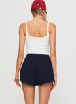 back view of model wearing Princess Polly Liora Short Navy High Waisted Shorts 