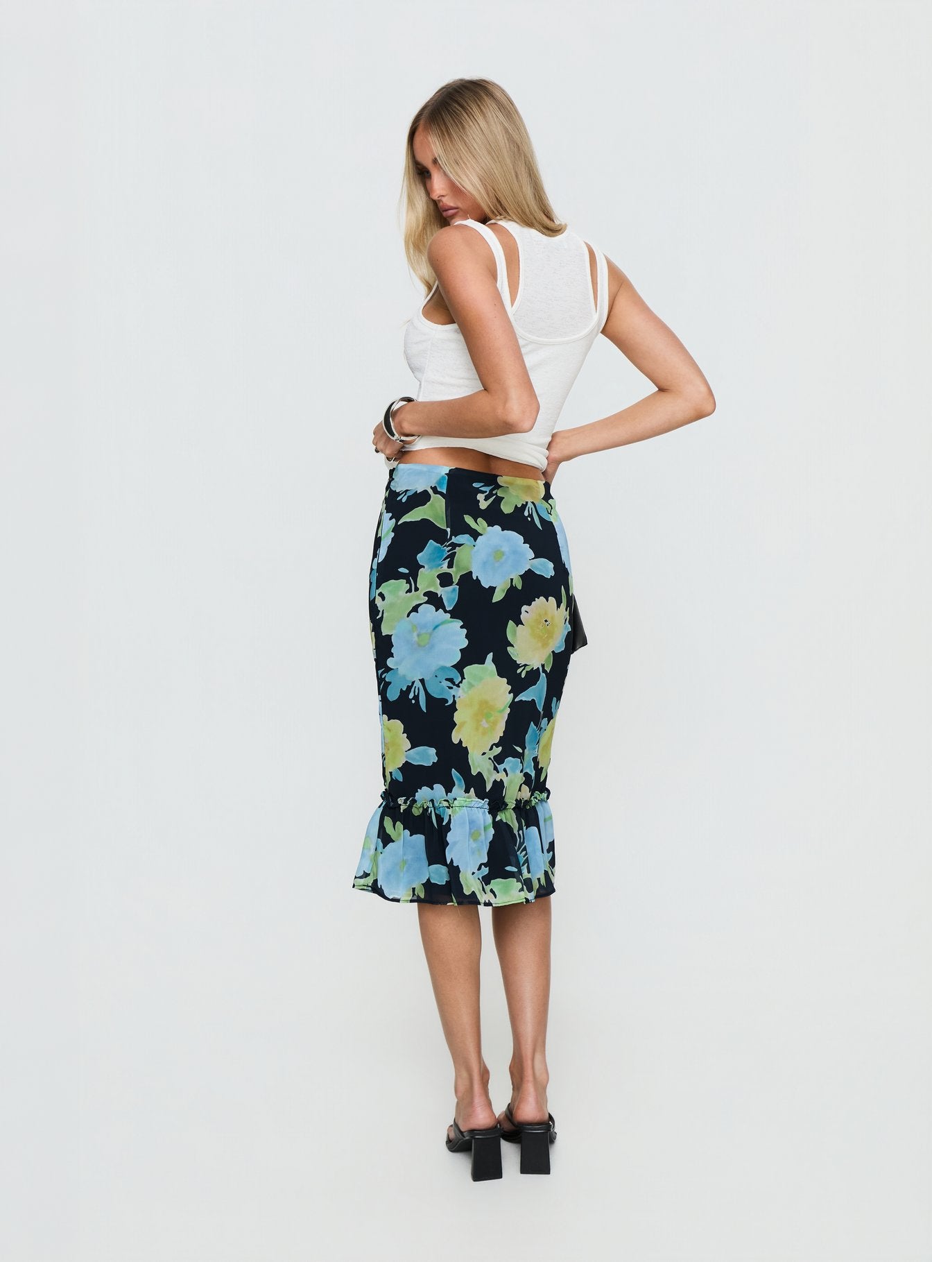 back view of model wearing Princess Polly Tarla Midi Skirt Crystal Black Flower Midi Skirts 