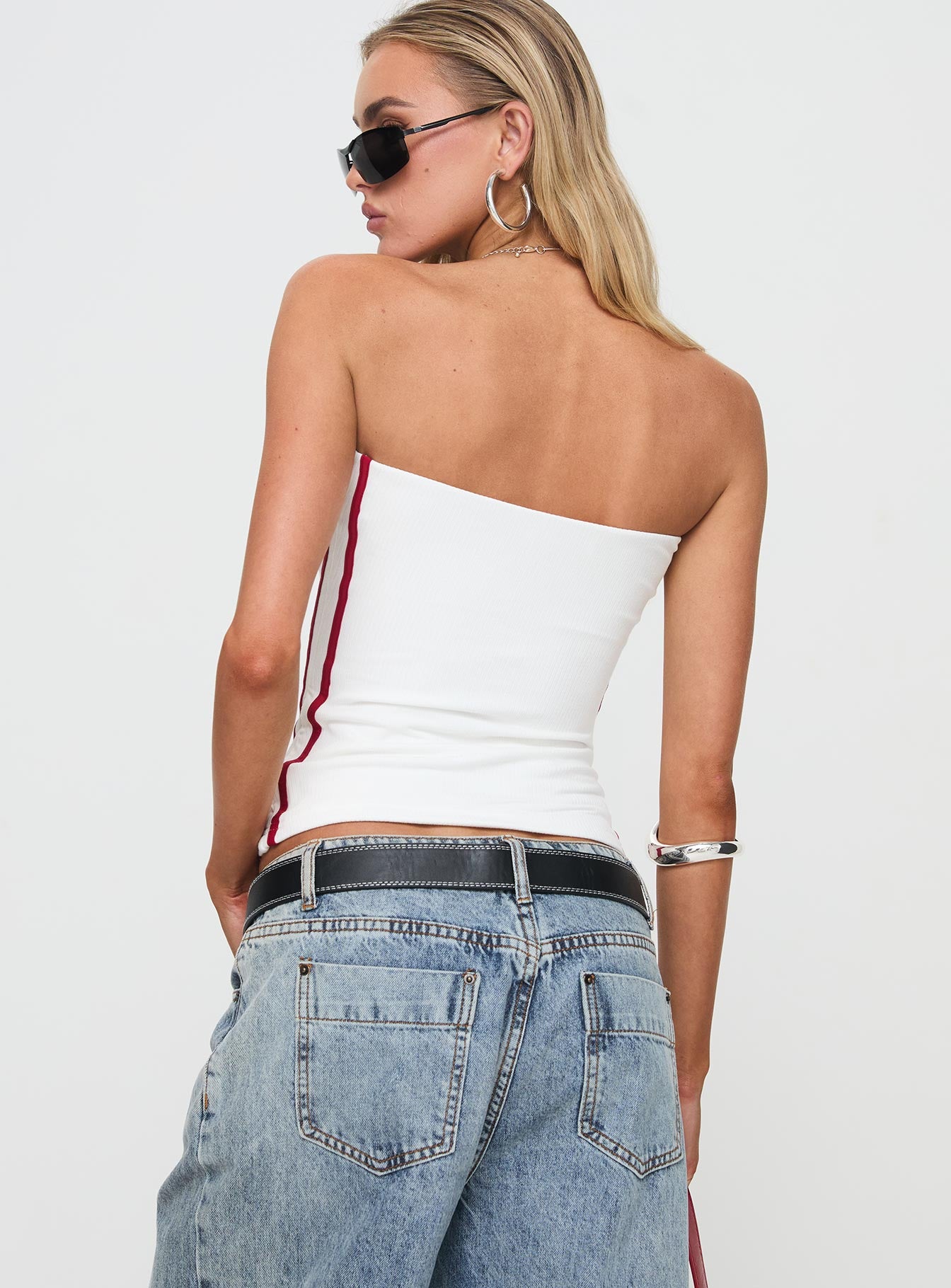 back view of model wearing Princess Polly Simpi Strapless Top White/Red Sleeveless straight 