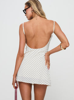 back view of model wearing Princess Polly Cookie Mini Dress White Polka Dot Scoop Neck 