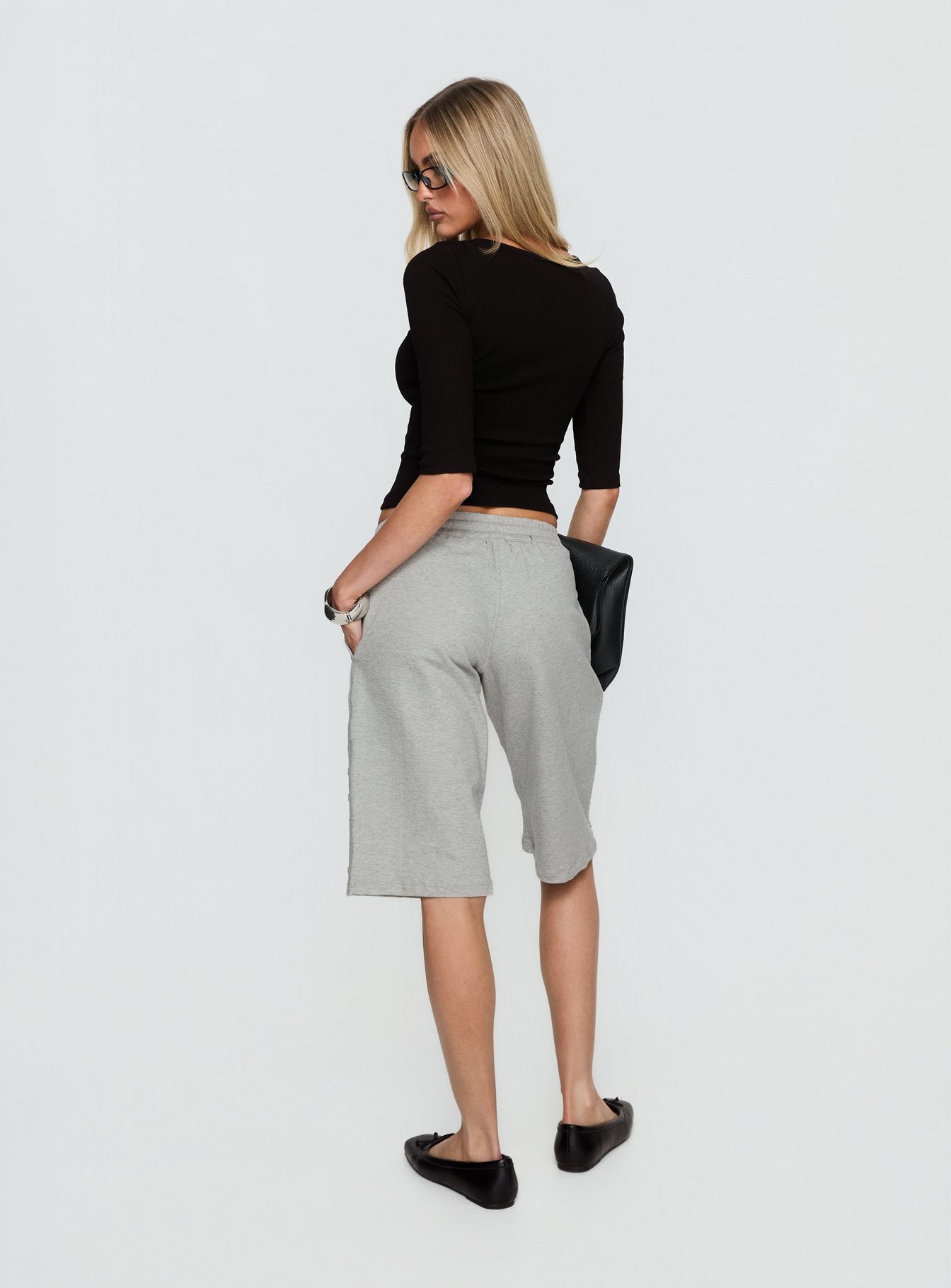 back view of model wearing Princess Polly Kether Longline Basketball Studs Short Grey Marle Mid Rise Pants 