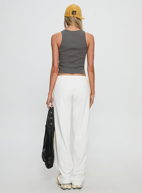 back view of model wearing Princess Polly Elation Low Rise Straight Leg Track Pant White Low Rise Pants 