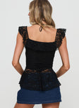 back view of model wearing Princess Polly Francia Frill Top Black Short Sleeves Square Neck 