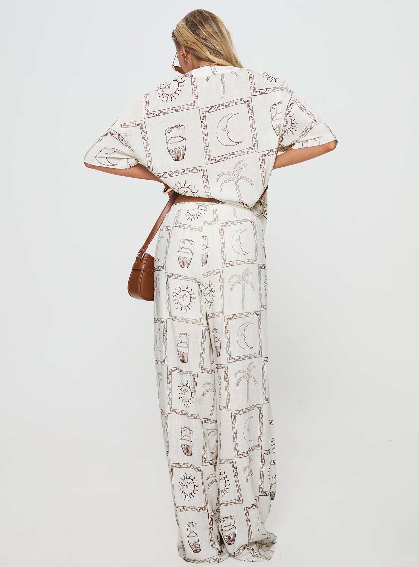 back view of model wearing Princess Polly Sun Dream Pants Cream / Multi High Waisted Pants 