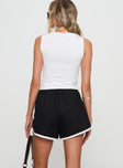 back view of model wearing Princess Polly Tyrah Shorts Black High Waisted Shorts 