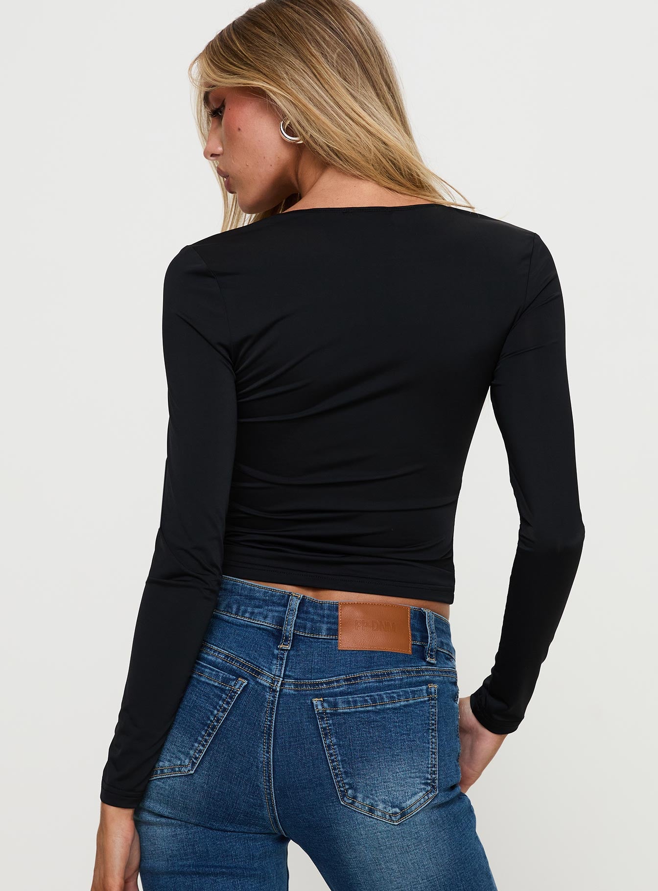 back view of model wearing Princess Polly Xandi Long Sleeve Top Black / Leopard Full Sleeves Square Neck 