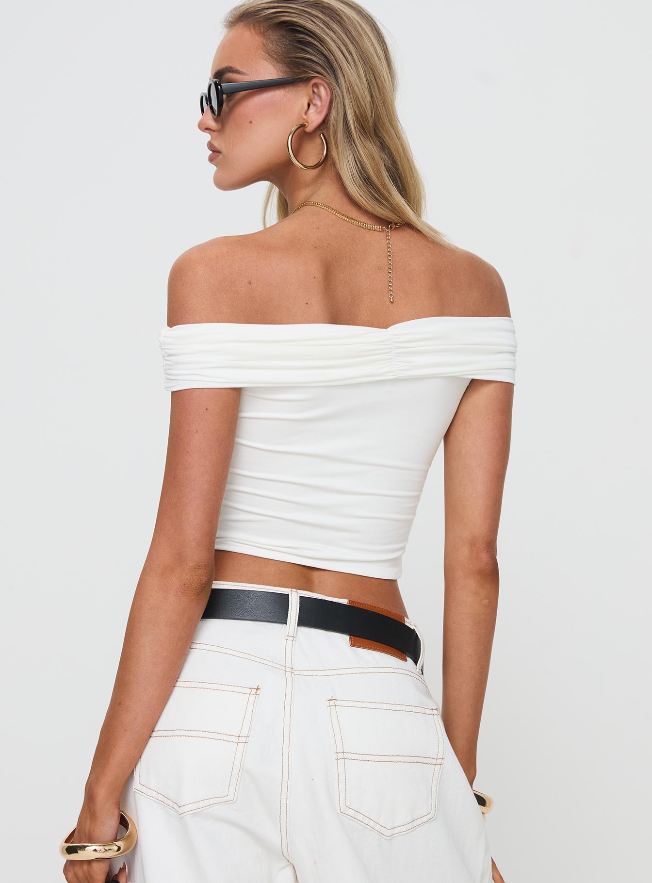 back view of model wearing Princess Polly Channel Off The Shoulder Top White Short Sleeves straight 