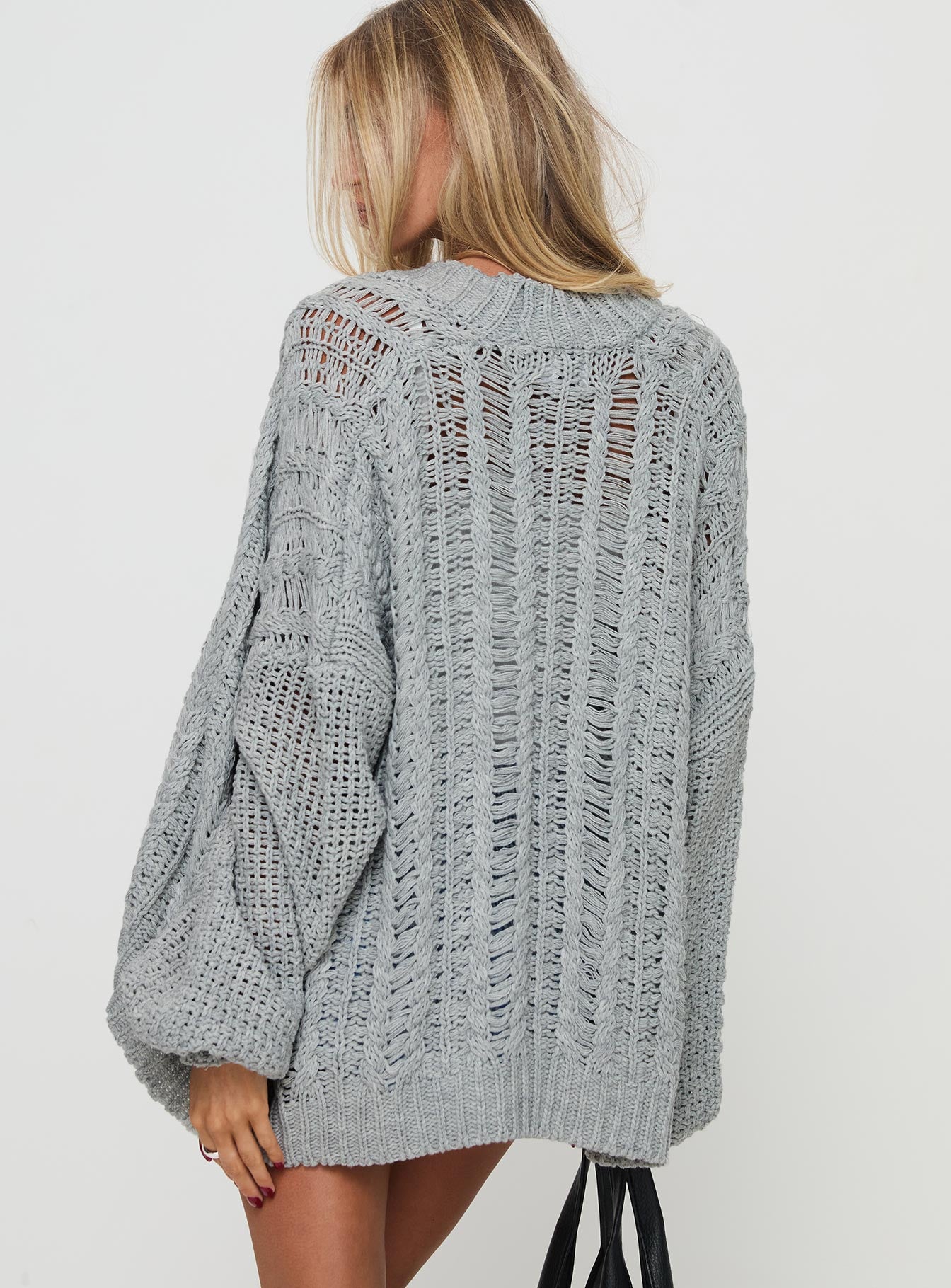back view of model wearing Princess Polly Abner Cable Cardigan Light Grey 