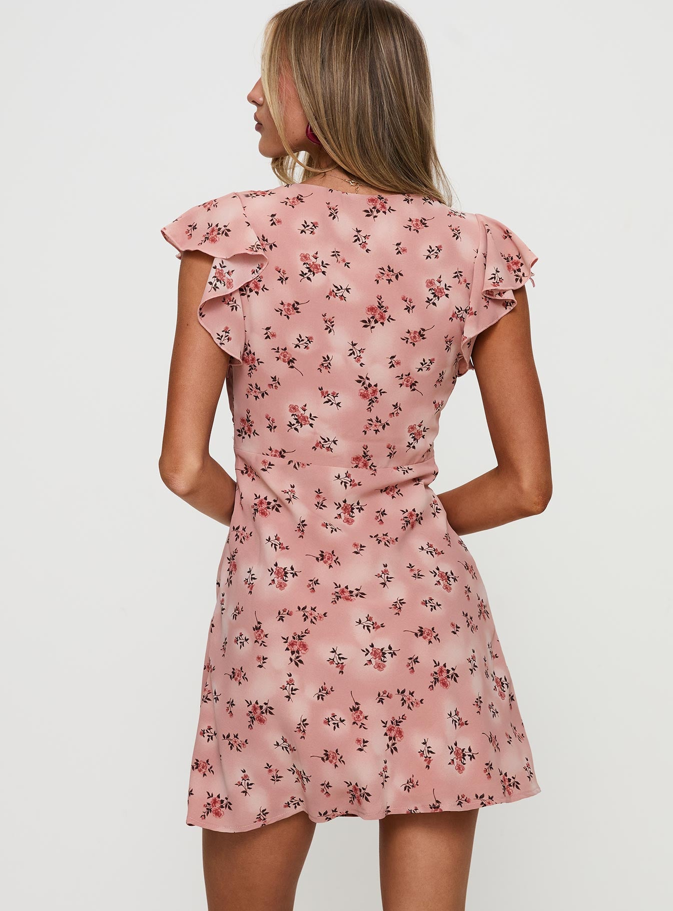 back view of model wearing Princess Polly Aurianna Mini Dress Pink Floral Sweetheart Neckline 