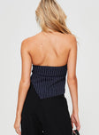 back view of model wearing Princess Polly Ezrala Top Navy Sleeveless Asymmetric Neckline 